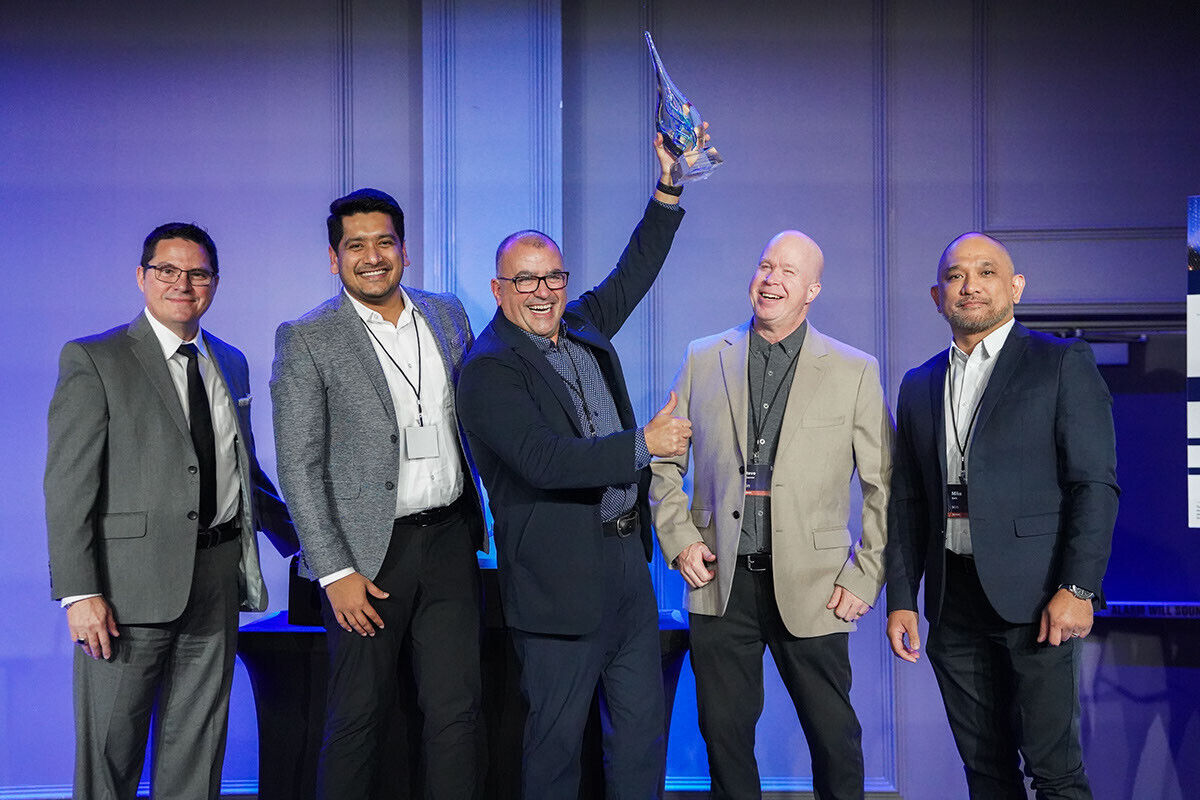 Strategic Sourcing Team at BGIS accepting the award for private sector team of the year.