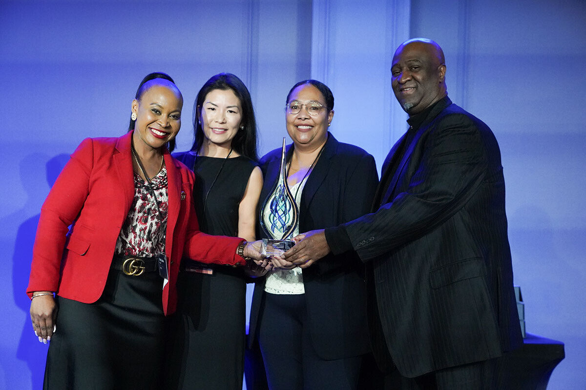 UHN team accepting award for public sector winner of the year.